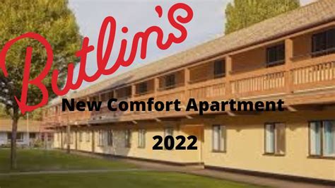 In the living area there is a big squishy corner sofa, facing a large LCD TV. . Comfort apartment butlins minehead